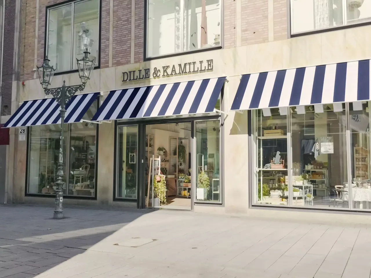Innenansicht des Dille & Kamille-Stores in der hausInvest Immobilie Flingerstraße in Düsseldorf.