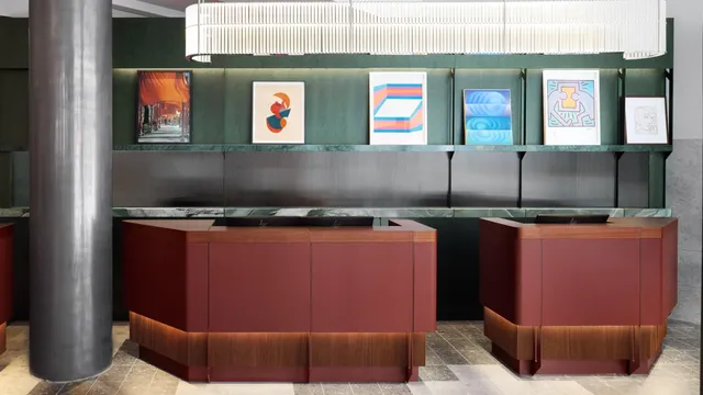 Es wir der Lobbybereich in der hausInvest Immobilie Kimpton Main Frankfurt dargestellt.
