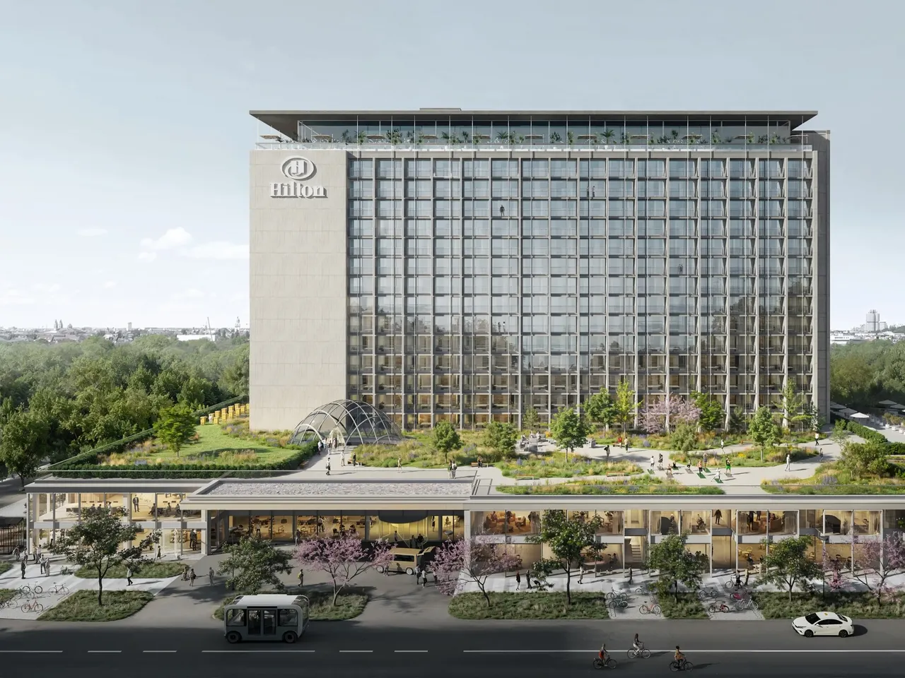 Es wird eine Visualisierung des Hilton Munich Park Hotels dargestellt, das sich in der hausInvest Immobilie im Münchner Tucherpark befindet.