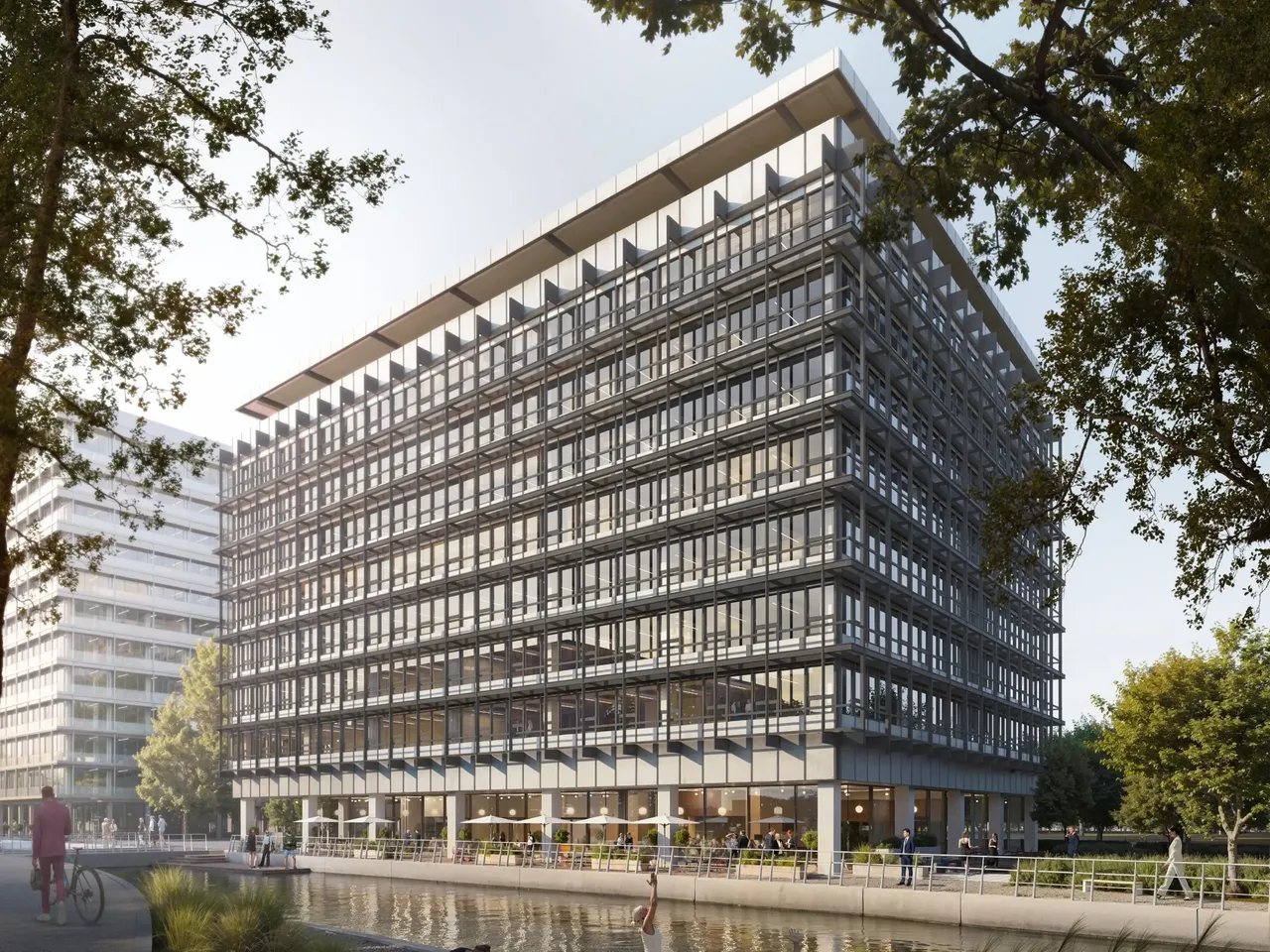 Es wird eine Visualisierung eines Bürogebäudes im Münchner Tucherpark dargestellt, der sich im Portfolio des Offenen Immobilienfonds hausInvest befindet.